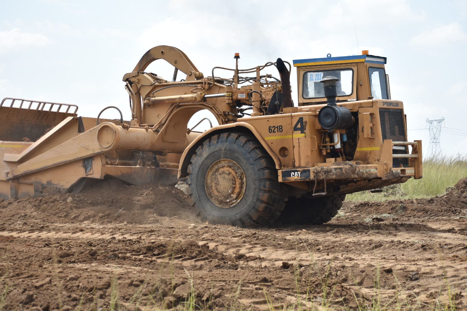 A Caterpillar 621B Scraper Working on Site