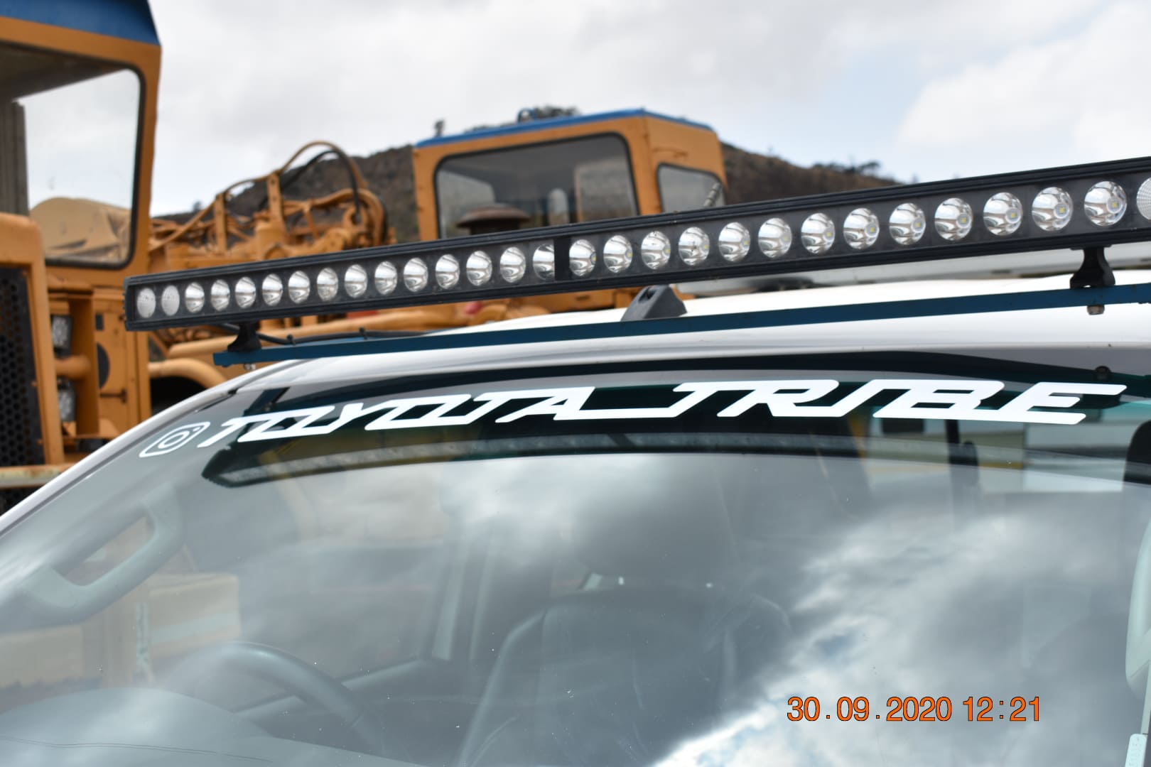 Japtrap Plant Hilux in the foreground With A Fleet of Caterpillar 621B Scrapers in the background